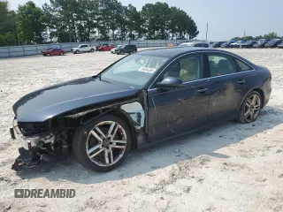 2015 Audi A6 Premium Plus with VIN WAUFMAFC3FN002954, listed as a Copart auction lot 58984395 with 176,231 mi miles and Salvage title. Bid and sale history available at DreamBid. Image 1.