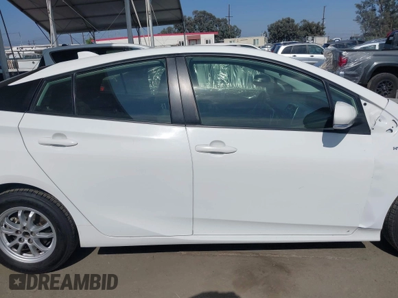 2022 Toyota Prius L Eco z VIN JTDKAMFU6N3177732, wystawiony jako IAAI lot #42504790 z przebiegiem 65 338 mil mil oraz . Historia ofert i sprzedaży dostępna na DreamBid. Obrazek 13.