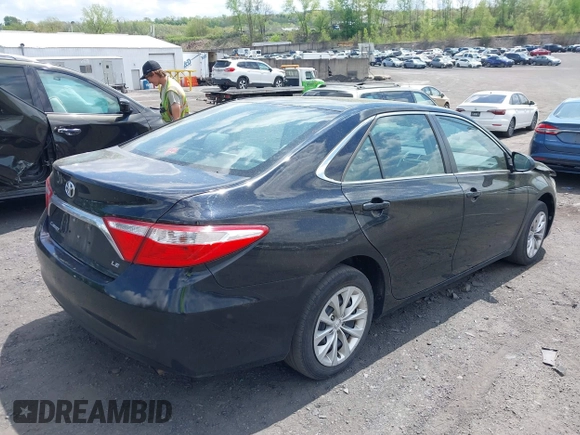 2015 Toyota Camry XLE with VIN 4T4BF1FK5FR491688, listed as a IAAI auction lot 42189497 with 135,126 mi miles and . Bid and sale history available at DreamBid. Image 4.