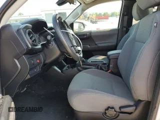 2021 Toyota Tacoma SR z VIN 3TYRX5GN1MT006883, wystawiony jako Copart lot #56224415 z przebiegiem 98 866 mil mil oraz Szkoda całkowita • Salvage title. Historia ofert i sprzedaży dostępna na DreamBid. Obrazek 7.