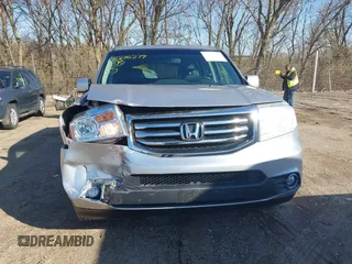 2012 Honda Pilot EX-L with VIN 5FNYF4H52CB029322, listed as a IAAI auction lot 41886279 with 156,436 mi miles and . Bid and sale history available at DreamBid. Image 12.