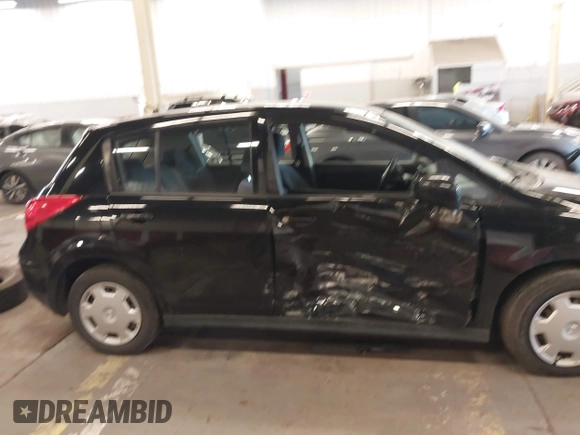 2009 Nissan Versa 1.8 S with VIN 3N1BC13E39L415491, listed as a IAAI auction lot 41614914 with 104,795 mi miles. Bid and sale history available at carsss.com. Image 13.
