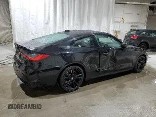 2021 BMW 4 Series M440i xDrive with VIN WBA13AR0XMCG68638, listed as a Copart auction lot 52142695 with 57,299 mi miles and Salvage Title. Bid and sale history available at DreamBid. Image 3.