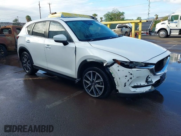 2018 Mazda CX-5 Touring with VIN JM3KFACM1J1431462, listed as a IAAI auction lot 41038099 with 77,489 mi miles. Bid and sale history available at carsss.com. Image 1.