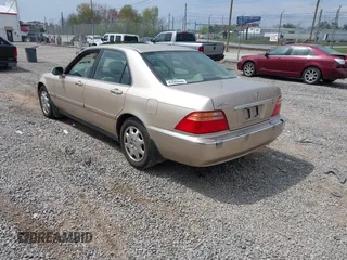 2001 Acura RL w/Navigation System z VIN JH4KA96661C002128, wystawiony jako IAAI lot #42000924 z przebiegiem 180 205 mil mil oraz . Historia ofert i sprzedaży dostępna na DreamBid. Obrazek 3.