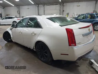 2012 Cadillac CTS Sedan Luxury with VIN 1G6DG5E55C0143029, listed as a IAAI auction lot 42099357 with 90,141 mi miles. Bid and sale history available at carsss.com. Image 3.