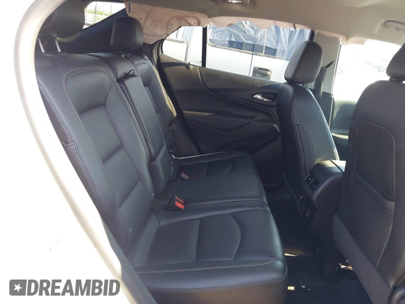 2021 Chevrolet Equinox Premier z VIN 2GNAXNEV9M6120241, wystawiony jako IAAI lot #42222928 z przebiegiem 104 274 mil mil oraz . Historia ofert i sprzedaży dostępna na DreamBid. Obrazek 8.