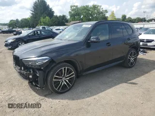2019 BMW X5 xDrive40i with VIN 5UXCR6C53KLL37212, listed as a Copart auction lot 61908365 with 61,818 mi miles and Salvage title. Bid and sale history available at DreamBid. Image 1.