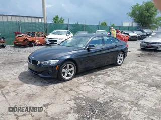 2015 BMW 4 Series 428i xDrive with VIN WBA4C9C52FD331620, listed as a IAAI auction lot 42556526 with 115,674 mi miles and . Bid and sale history available at DreamBid. Image 18.