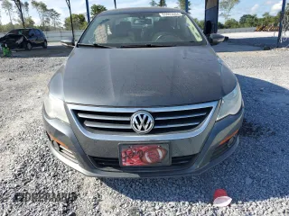 2009 Volkswagen CC Luxury with VIN WVWHL73C19E509071, listed as a Copart auction lot 65923464 with 128,841 mi miles and Salvage Title. Bid and sale history available at carsss.com. Image 5.