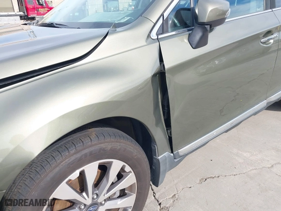 2017 Subaru Outback Touring with VIN 4S4BSETCXH3371887, listed as a IAAI auction lot 41692515 with 57,039 mi miles. Bid and sale history available at carsss.com. Image 17.
