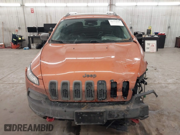 2015 Jeep Cherokee Trailhawk with VIN 1C4PJMBS5FW524462, listed as a IAAI auction lot 41774347 with 107,592 mi miles. Bid and sale history available at carsss.com. Image 13.