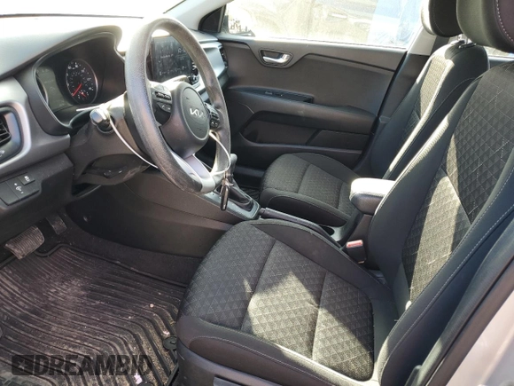 2023 Kia Rio S with VIN 3KPA24AD3PE573628, listed as a Copart auction lot 48886565 with 28,236 mi miles and Salvage Title. Bid and sale history available at carsss.com. Image 7.