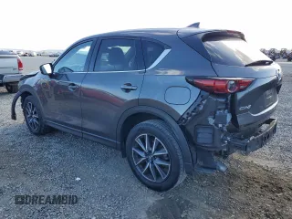 2018 Mazda CX-5 Grand Touring with VIN JM3KFADM8J1330353, listed as a Copart auction lot 54752325 with 96,577 mi miles and Salvage Title. Bid and sale history available at DreamBid. Image 2.