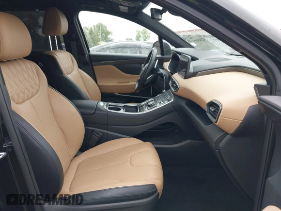 2023 Hyundai Santa Fe Calligraphy with VIN 5NMS5DAL9PH606417, listed as a IAAI auction lot 42349495 with 13,417 mi miles and . Bid and sale history available at DreamBid. Image 5.