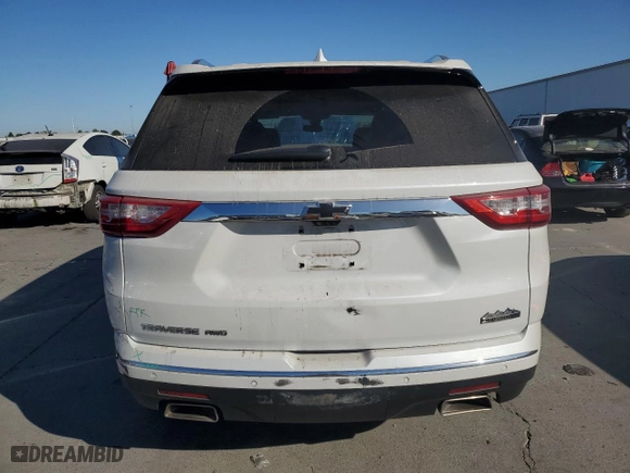 2021 Chevrolet Traverse High Country with VIN 1GNEVNKW8MJ225604, listed as a Copart auction lot 74614544 with 62,801 mi miles and Salvage Title. Bid and sale history available at carsss.com. Image 6.