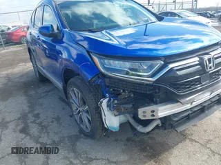 2020 Honda CR-V Touring with VIN 7FARW2H91LE012284, listed as a IAAI auction lot 41672460 with 28,207 mi miles and . Bid and sale history available at DreamBid. Image 18.