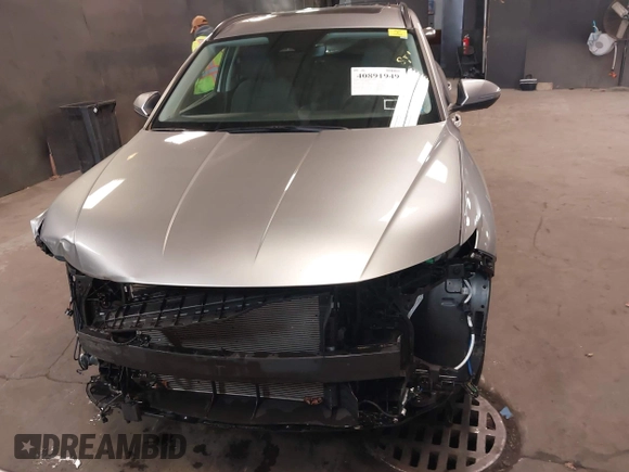 2022 Hyundai Tucson SEL with VIN 5NMJFCAE7NH128788, listed as a IAAI auction lot 40891949 with 21,665 mi miles. Bid and sale history available at carsss.com. Image 13.