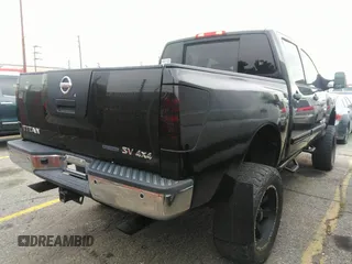 2012 Nissan Titan SL with VIN 1N6BA0EC7CN302866, listed as a IAAI auction lot 36423631 with 108,358 mi miles and . Bid and sale history available at DreamBid. Image 4.