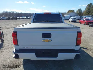 2018 Chevrolet Silverado 1500 LT with VIN 1GCVKREC5JZ350034, listed as a IAAI auction lot 41649277 with 112,673 mi miles. Bid and sale history available at carsss.com. Image 16.