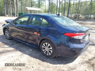 2021 Toyota Corolla Hybrid LE with VIN JTDEAMDE9MJ008582, listed as a IAAI auction lot 41998098 with 113,863 mi miles. Bid and sale history available at carsss.com. Image 3.