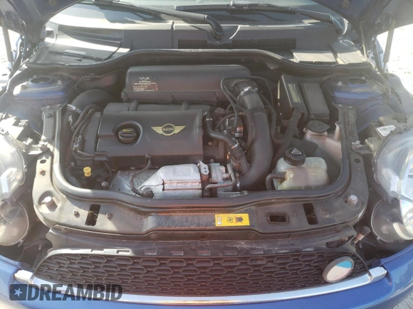 2012 MINI Coupe S z VIN WMWSX3C59CT465664, wystawiony jako Copart lot #53551055 z przebiegiem 94 390 mil mil oraz Szkoda całkowita • Salvage title. Historia ofert i sprzedaży dostępna na DreamBid. Obrazek 11.