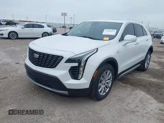 2023 Cadillac XT4 FWD Premium Luxury with VIN 1GYFZCR49PF225817, listed as a IAAI auction lot 42408494 with 5,977 mi miles and . Bid and sale history available at DreamBid. Image 2.