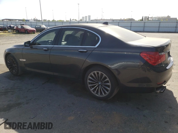 2012 BMW 7 Series 740i with VIN WBAKA4C54CC613419, listed as a Copart auction lot 54420885 with 104,006 mi miles and Salvage Title. Bid and sale history available at DreamBid. Image 2.
