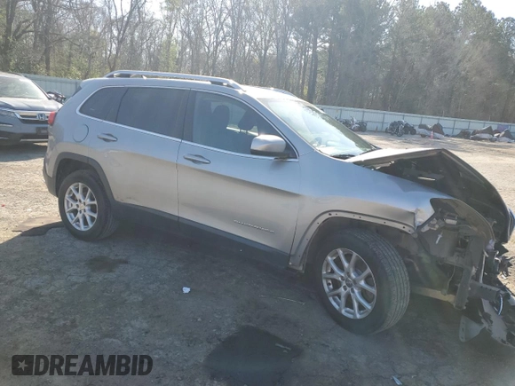 2015 Jeep Cherokee Latitude with VIN 1C4PJLCB5FW790959, listed as a Copart auction lot 47581375 with 157,139 mi miles and Salvage Title. Bid and sale history available at DreamBid. Image 4.