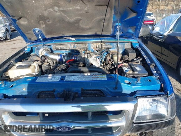 2000 Ford Ranger XL with VIN 1FTYR14C7YTA97775, listed as a IAAI auction lot 40771596 with 180,788 mi miles. Bid and sale history available at carsss.com. Image 10.