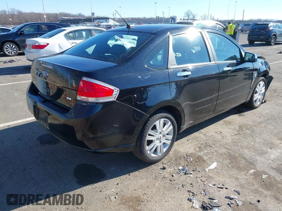 2009 Ford Focus SEL with VIN 1FAHP37N49W211350, listed as a IAAI auction lot 41641517 with 59,409 mi miles. Bid and sale history available at carsss.com. Image 4.