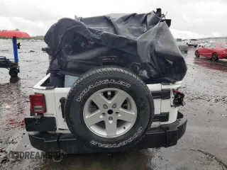 2018 Jeep Wrangler Unlimited Sport S z VIN 1C4BJWDG1JL855855, wystawiony jako Copart lot #56907455 z przebiegiem 61 437 mil mil oraz Szkoda całkowita • Salvage title. Historia ofert i sprzedaży dostępna na DreamBid. Obrazek 6.