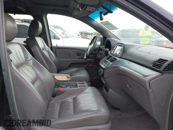 2010 Honda Odyssey Touring with VIN 5FNRL3H95AB040354, listed as a IAAI auction lot 41889501 with 155,069 mi miles. Bid and sale history available at carsss.com. Image 5.