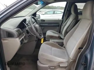 2005 Ford Freestar SE z VIN 2FMZA51615BA67146, wystawiony jako Copart lot #71000634 z przebiegiem 84 096 mil mil oraz Szkody całkowita. Historia ofert i sprzedaży dostępna na DreamBid. Obrazek 7.