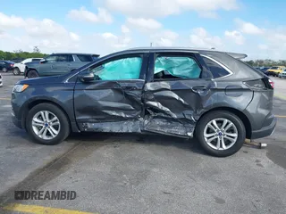 2020 Ford Edge SEL with VIN 2FMPK4J90LBA60985, listed as a IAAI auction lot 41590512 with 141,733 mi miles. Bid and sale history available at carsss.com. Image 14.