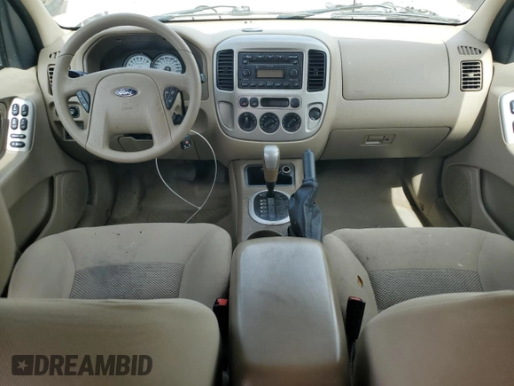2005 Ford Escape XLT with VIN 1FMYU03165KC03784, listed as a Copart auction lot 64299225 with 185,033 mi miles and Salvage title. Bid and sale history available at DreamBid. Image 8.