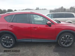 2016 Mazda CX-5 Grand Touring with VIN JM3KE4DY6G0740347, listed as a IAAI auction lot 41101437 with 81,586 mi miles. Bid and sale history available at carsss.com. Image 14.
