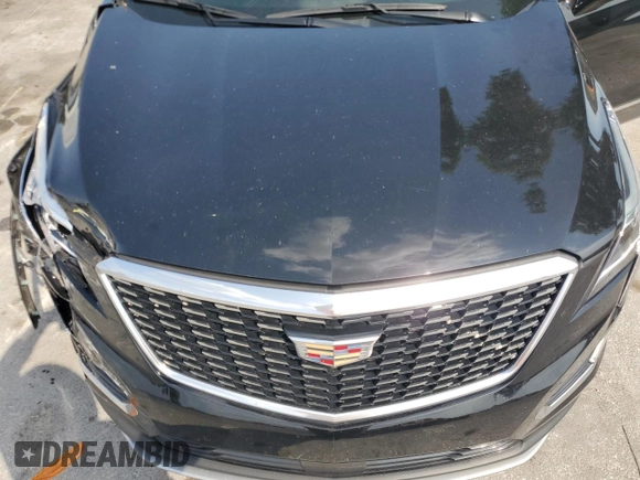 2022 Cadillac XT5 FWD Premium Luxury z VIN 1GYKNCRS7NZ101131, wystawiony jako Copart lot #56365065 z przebiegiem 74 168 mil mil oraz Szkoda całkowita • Salvage title. Historia ofert i sprzedaży dostępna na DreamBid. Obrazek 12.