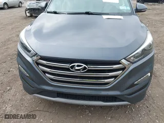 2017 Hyundai Tucson Value with VIN KM8J33A21HU359113, listed as a IAAI auction lot 41897638 with 80,010 mi miles. Bid and sale history available at carsss.com. Image 12.
