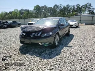 2013 Volkswagen CC Sport Plus z VIN WVWBP7AN7DE515951, wystawiony jako Copart lot #52251575 z przebiegiem 121 414 mil mil oraz Szkody całkowita. Historia ofert i sprzedaży dostępna na DreamBid. Obrazek 13.
