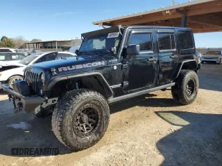 2014 Jeep Wrangler Unlimited Rubicon X with VIN 1C4HJWFG8EL119654, listed as a Copart auction lot 46699055 with 148,412 mi miles and Salvage title. Bid and sale history available at DreamBid. Image 1.