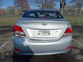 2013 Hyundai Accent GLS with VIN KMHCT4AE4DU477465, listed as a IAAI auction lot 41930256 with 48,877 mi miles and . Bid and sale history available at carsss.com. Image 16.