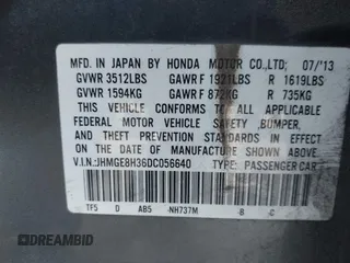 2013 Honda Fit with VIN JHMGE8H36DC056640, listed as a IAAI auction lot 41969727 with 94,564 mi miles. Bid and sale history available at carsss.com. Image 9.