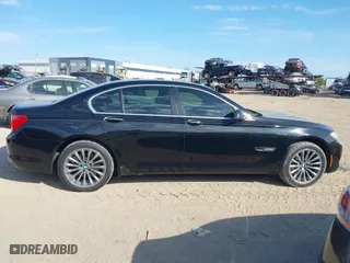 2012 BMW 7 Series 740i with VIN WBAKA4C51CC613636, listed as a IAAI auction lot 41908801 with 127,725 mi miles. Bid and sale history available at carsss.com. Image 14.