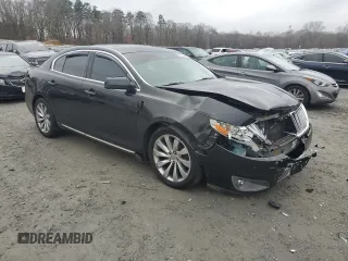 2012 Lincoln MKS with VIN 1LNHL9ER3CG806878, listed as a Copart auction lot 87162644 with 136,878 mi miles and Salvage Title. Bid and sale history available at DreamBid. Image 4.