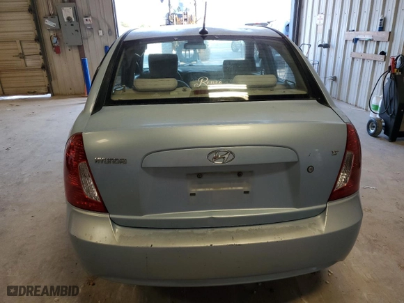 2011 Hyundai Accent GLS with VIN KMHCN4AC1BU615615, listed as a Copart auction lot 52428885 with 122,334 mi miles and Salvage Title. Bid and sale history available at carsss.com. Image 6.