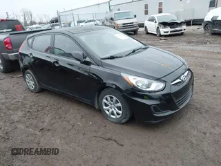 2014 Hyundai Accent GS with VIN KMHCT5AE9EU197712, listed as a IAAI auction lot 41493618 with 83,890 mi miles. Bid and sale history available at carsss.com. Image 1.