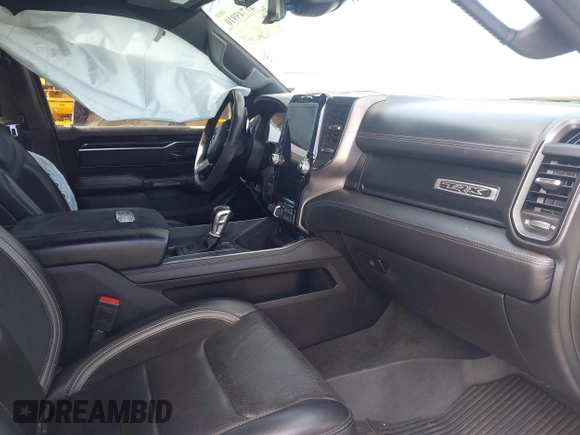 2021 Ram 1500 TRX with VIN 1C6SRFU9XMN905260, listed as a IAAI auction lot 41745910 with 69,565 mi miles and . Bid and sale history available at DreamBid. Image 5.