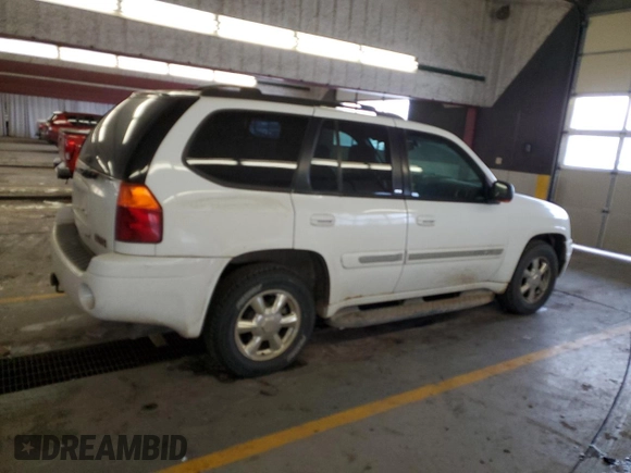 2002 GMC Envoy SLT with VIN 1GKDT13S622231265, listed as a Copart auction lot 45037215 with 213,069 mi miles and Salvage Title. Bid and sale history available at carsss.com. Image 3.