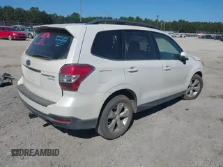 2014 Subaru Forester 2.5i Touring with VIN JF2SJAMC6EH413261, listed as a IAAI auction lot 40672035 with 1 mi miles. Bid and sale history available at carsss.com. Image 4.